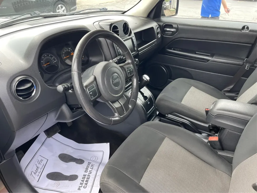 2014 Jeep Patriot Latitude 4WD (1C4NJRFB5ED) with an 2.4L L4 DOHC 16V engine, located at 1230 East Main St, Xenia, OH, 45385, (937) 908-9800, 39.688026, -83.910172 - **Adventure Awaits with the 2014 Jeep Patriot Latitude 4WD!**<br /> <br /> If you're longing for a vehicle that blends rugged capability with everyday comfort, look no further than the 2014 Jeep Patriot Latitude 4WD. Perfect for weekend adventures or daily commutes, this SUV is designed to take you - Photo#2