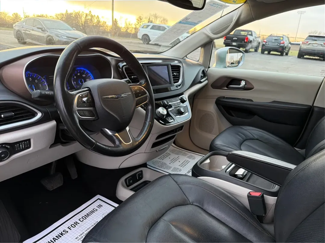 2019 Chrysler Pacifica Touring-L (2C4RC1BG5KR) with an 3.6L V6 DOHC 24V engine, 9-Speed Automatic transmission, located at 1099 N County Rd 25A, Troy, OH, 45373, (937) 908-9800, 40.057079, -84.212883 - **Experience Family Adventures with the 2019 Chrysler Pacifica Touring-L from Advantage Car and Credit!**<br /> <br /> Are you searching for the perfect vehicle to accommodate your family's growing needs? Look no further! The 2019 Chrysler Pacifica Touring-L is designed with families in mind, offeri - Photo#9