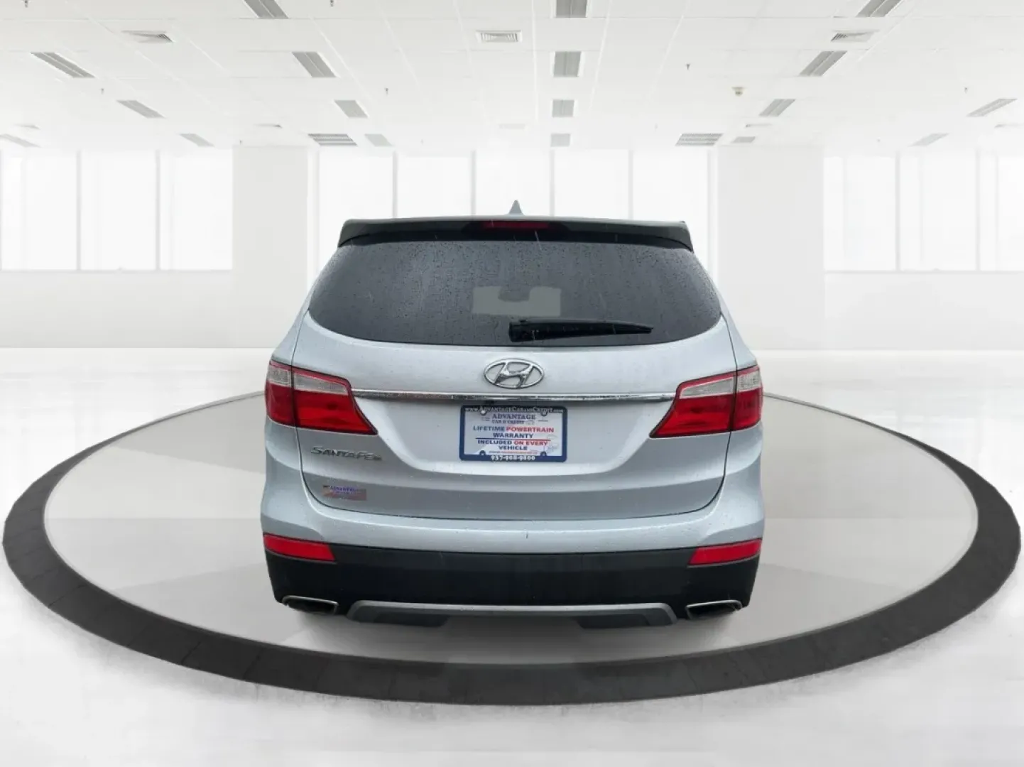 2014 Hyundai Santa Fe GLS (KM8SM4HF5EU) with an Lambda II 3.3L V-6 gasoline direct injection engine, located at 8750 N County Rd 25A, Piqua, OH, 45356, (937) 908-9800, 40.164391, -84.232513 - Looking for the perfect SUV to complement your busy lifestyle? Look no further than the 2014 Hyundai Santa Fe GLS, a vehicle designed for families, adventurers, and commuters alike. This reliable SUV, available at Advantage Car and Credit in Fairborn, OH, provides ample space, comfort, and modern fe - Photo#3