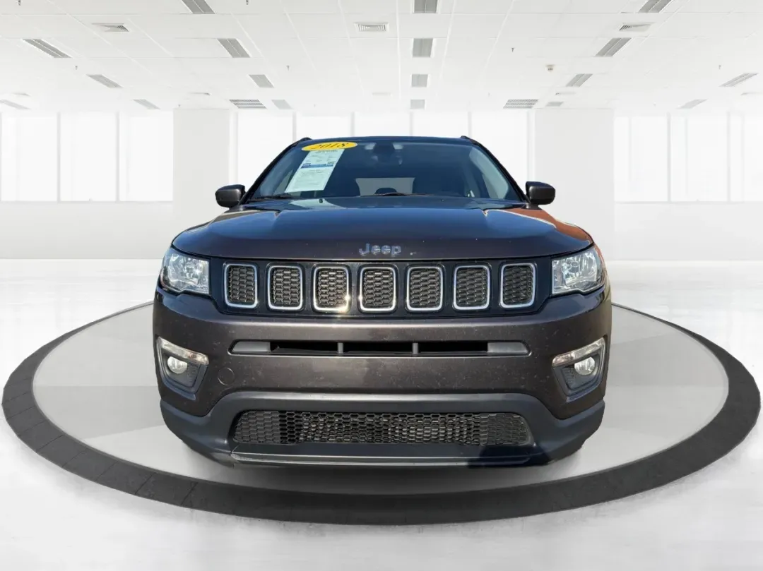 2018 Jeep Compass Latitude FWD (3C4NJCBB1JT) with an 2.4L I-4 variable valve control engine, located at 1951 S Dayton Lakeview Rd., New Carlisle, OH, 45344, (937) 908-9800, 39.890999, -84.050255 - **Adventure Awaits with This 2018 Jeep Compass Latitude FWD!**<br /> <br /> Transform your everyday travels into unforgettable adventures with the 2018 Jeep Compass Latitude FWD. This SUV is not just a mode of transportation; it's your ticket to exploration, whether it's cruising through the scenic - Photo#7