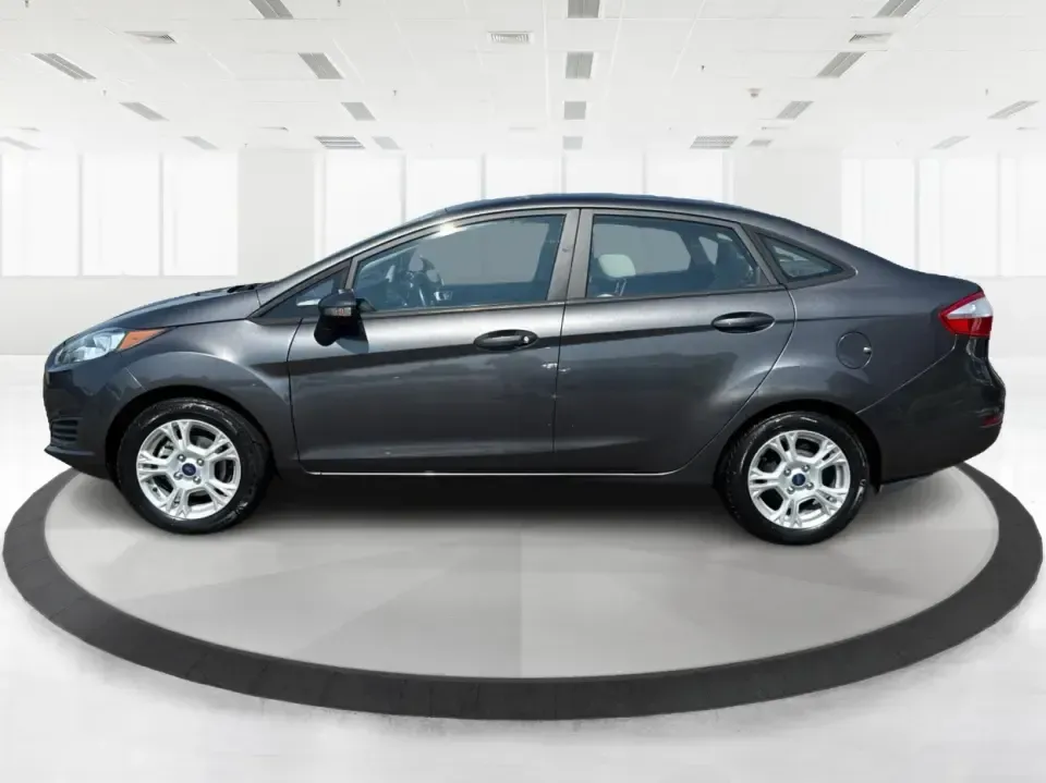 2015 Ford Fiesta SE (3FADP4BJ4FM) with an EcoBoost 1L I-3 gasoline direct injection engine, Automatic transmission, located at 8750 N County Rd 25A, Piqua, OH, 45356, (937) 908-9800, 40.164391, -84.232513 - **Discover Adventure and Style with the 2015 Ford Fiesta SE at Advantage Car and Credit in Fairborn, OH!**<br /> <br /> Are you ready to elevate your daily commute or weekend adventures? The 2015 Ford Fiesta SE is the ideal sedan for budget-conscious buyers seeking a reliable and stylish companion. - Photo#5