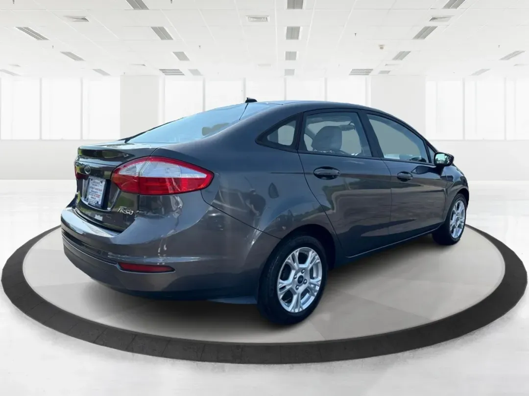 2015 Ford Fiesta SE (3FADP4BJ4FM) with an EcoBoost 1L I-3 gasoline direct injection engine, located at 8750 N County Rd 25A, Piqua, OH, 45356, (937) 908-9800, 40.164391, -84.232513 - **Discover Adventure and Style with the 2015 Ford Fiesta SE at Advantage Car and Credit in Fairborn, OH!**<br /> <br /> Are you ready to elevate your daily commute or weekend adventures? The 2015 Ford Fiesta SE is the ideal sedan for budget-conscious buyers seeking a reliable and stylish companion. - Photo#2
