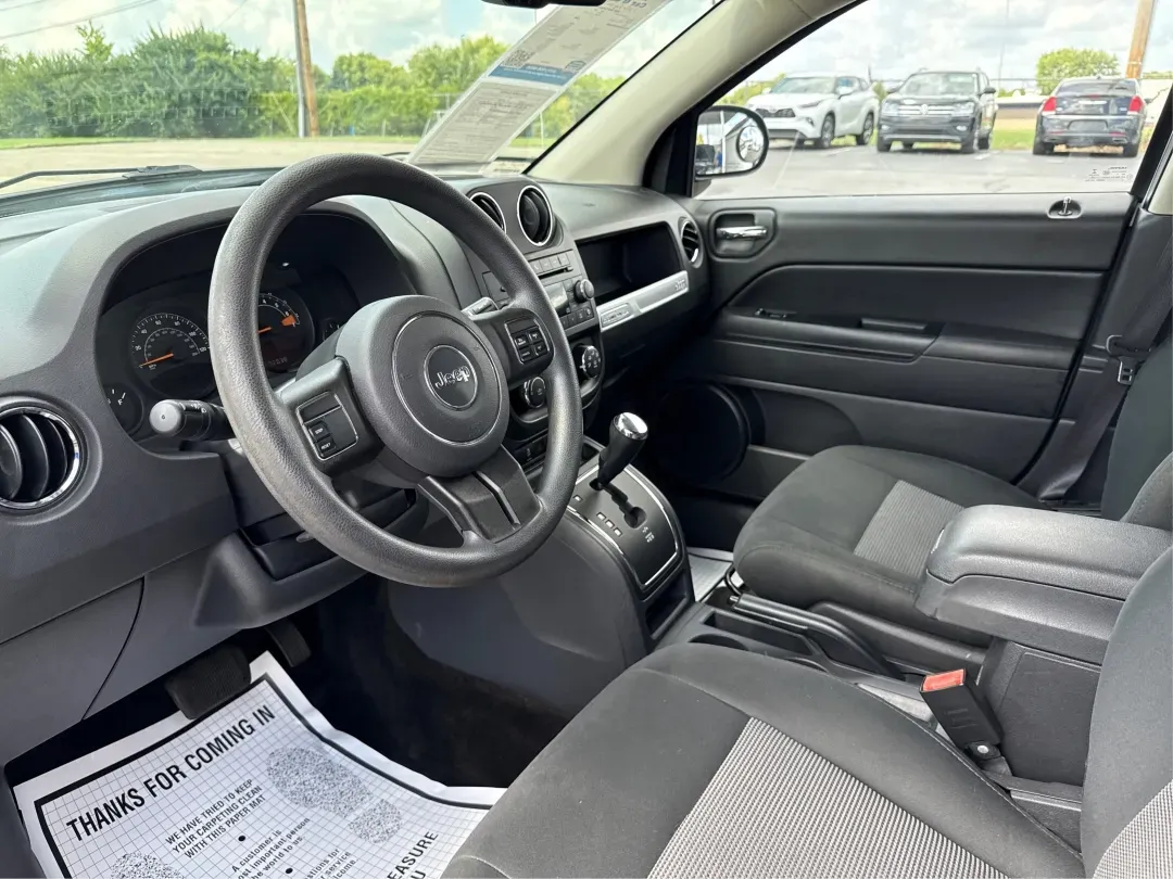 2014 Jeep Compass Sport (1C4NJDBB4ED) with an 2.4L I-4 DOHC engine, located at 1230 East Main St, Xenia, OH, 45385, (937) 908-9800, 39.688026, -83.910172 - **Experience Adventure with the 2014 Jeep Compass Sport at Advantage Car and Credit Xenia!** <br /> <br /> Are you ready to embrace the open road with a vehicle that combines comfort, capability, and style? The 2014 Jeep Compass Sport, available at Advantage Car and Credit in Xenia, Ohio, is the pe - Photo#9