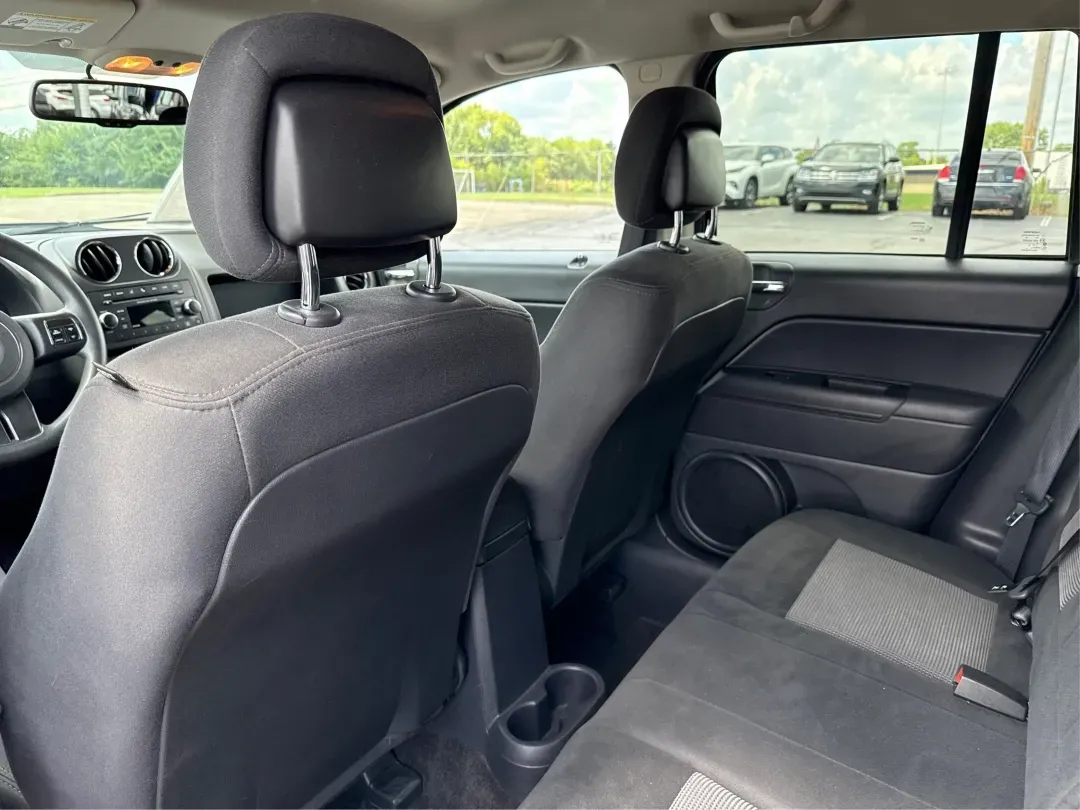 2014 Jeep Compass Sport (1C4NJDBB4ED) with an 2.4L I-4 DOHC engine, located at 1230 East Main St, Xenia, OH, 45385, (937) 908-9800, 39.688026, -83.910172 - **Experience Adventure with the 2014 Jeep Compass Sport at Advantage Car and Credit Xenia!** <br /> <br /> Are you ready to embrace the open road with a vehicle that combines comfort, capability, and style? The 2014 Jeep Compass Sport, available at Advantage Car and Credit in Xenia, Ohio, is the pe - Photo#10