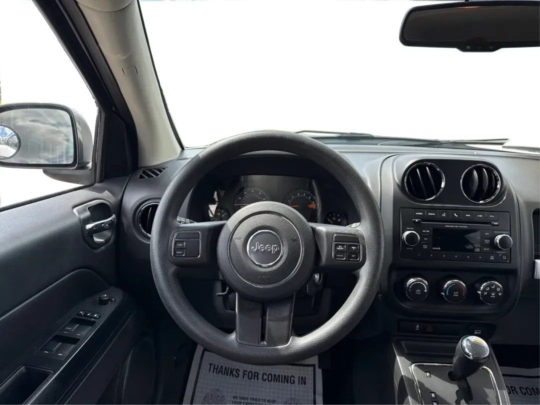 2014 Jeep Compass Sport (1C4NJDBB4ED) with an 2.4L I-4 DOHC engine, located at 1230 East Main St, Xenia, OH, 45385, (937) 908-9800, 39.688026, -83.910172 - **Experience Adventure with the 2014 Jeep Compass Sport at Advantage Car and Credit Xenia!** <br /> <br /> Are you ready to embrace the open road with a vehicle that combines comfort, capability, and style? The 2014 Jeep Compass Sport, available at Advantage Car and Credit in Xenia, Ohio, is the pe - Photo#21