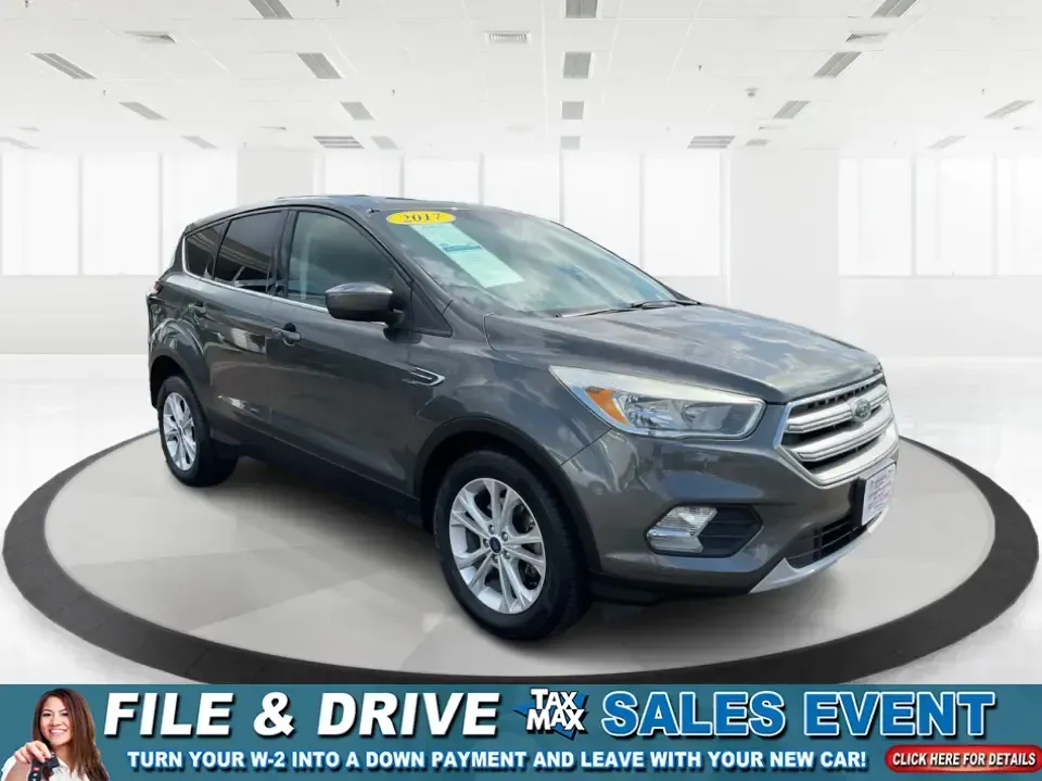2017 Ford Escape SE (1FMCU0GD7HU) with an 1.5L L4 DOHC 16V engine, 6A transmission, located at 1099 N County Rd 25A, Troy, OH, 45373, (937) 908-9800, 40.057079, -84.212883 - **Experience Life on the Move with the 2017 Ford Escape SE at Advantage Car and Credit - Troy!**<br /> <br /> Are you ready to elevate your lifestyle with a versatile SUV that's perfect for family outings and weekend adventures? Look no further than the 2017 Ford Escape SE, available at Advantage Ca - Photo#0