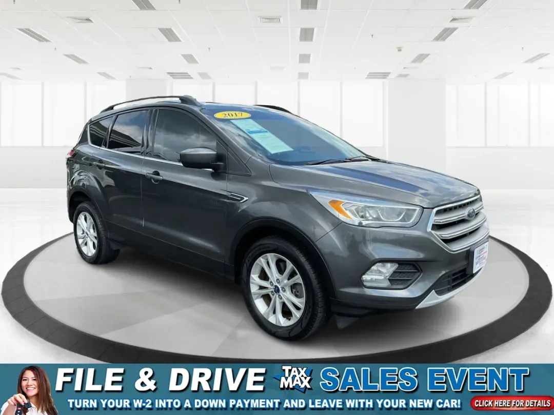 2017 Ford Escape SE (1FMCU9GD7HU) with an Other engine, located at 1099 N County Rd 25A, Troy, OH, 45373, (937) 908-9800, 40.057079, -84.212883 - **Adventure Awaits With This 2017 Ford Escape SE! Perfect for Your Next Journey!**<br /> <br /> Are you ready to elevate your weekend getaways or daily commutes? The 2017 Ford Escape SE is the ideal SUV for those who crave versatility without sacrificing style. With a spacious interior, advanced saf - Photo#0