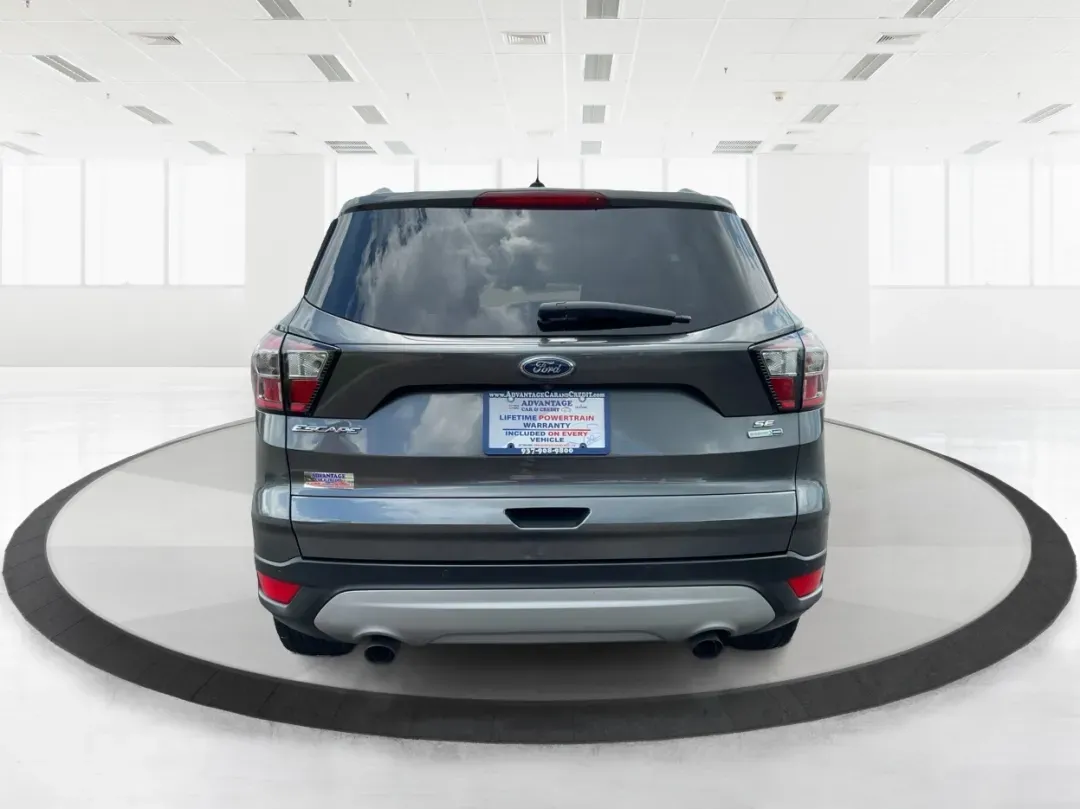 2017 Ford Escape SE (1FMCU9GD7HU) with an Other engine, located at 1099 N County Rd 25A, Troy, OH, 45373, (937) 908-9800, 40.057079, -84.212883 - **Adventure Awaits With This 2017 Ford Escape SE! Perfect for Your Next Journey!**<br /> <br /> Are you ready to elevate your weekend getaways or daily commutes? The 2017 Ford Escape SE is the ideal SUV for those who crave versatility without sacrificing style. With a spacious interior, advanced saf - Photo#3