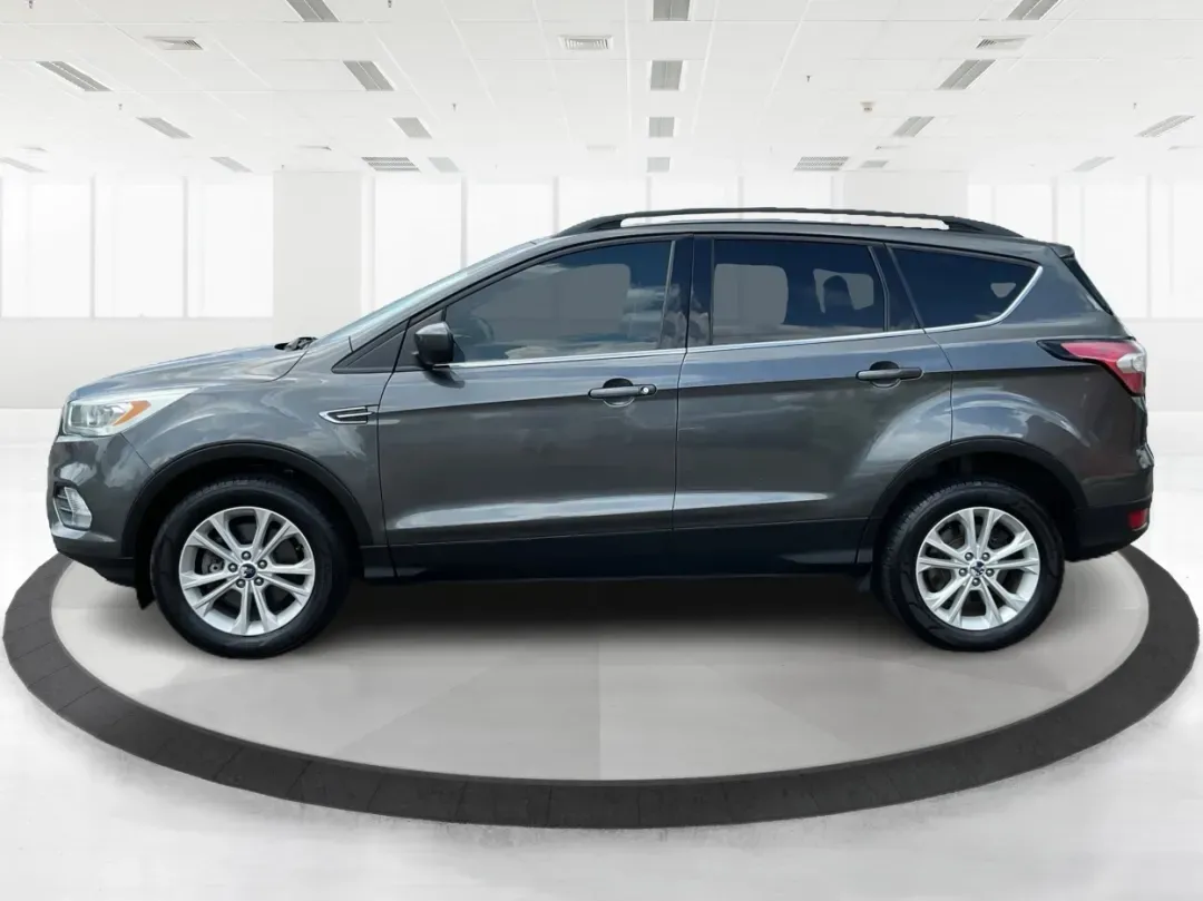 2017 Ford Escape SE (1FMCU9GD7HU) with an Other engine, located at 1099 N County Rd 25A, Troy, OH, 45373, (937) 908-9800, 40.057079, -84.212883 - **Adventure Awaits With This 2017 Ford Escape SE! Perfect for Your Next Journey!**<br /> <br /> Are you ready to elevate your weekend getaways or daily commutes? The 2017 Ford Escape SE is the ideal SUV for those who crave versatility without sacrificing style. With a spacious interior, advanced saf - Photo#5