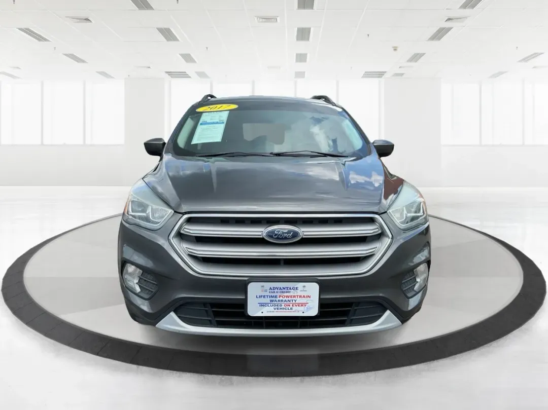 2017 Ford Escape SE (1FMCU9GD7HU) with an Other engine, located at 1099 N County Rd 25A, Troy, OH, 45373, (937) 908-9800, 40.057079, -84.212883 - **Adventure Awaits With This 2017 Ford Escape SE! Perfect for Your Next Journey!**<br /> <br /> Are you ready to elevate your weekend getaways or daily commutes? The 2017 Ford Escape SE is the ideal SUV for those who crave versatility without sacrificing style. With a spacious interior, advanced saf - Photo#7