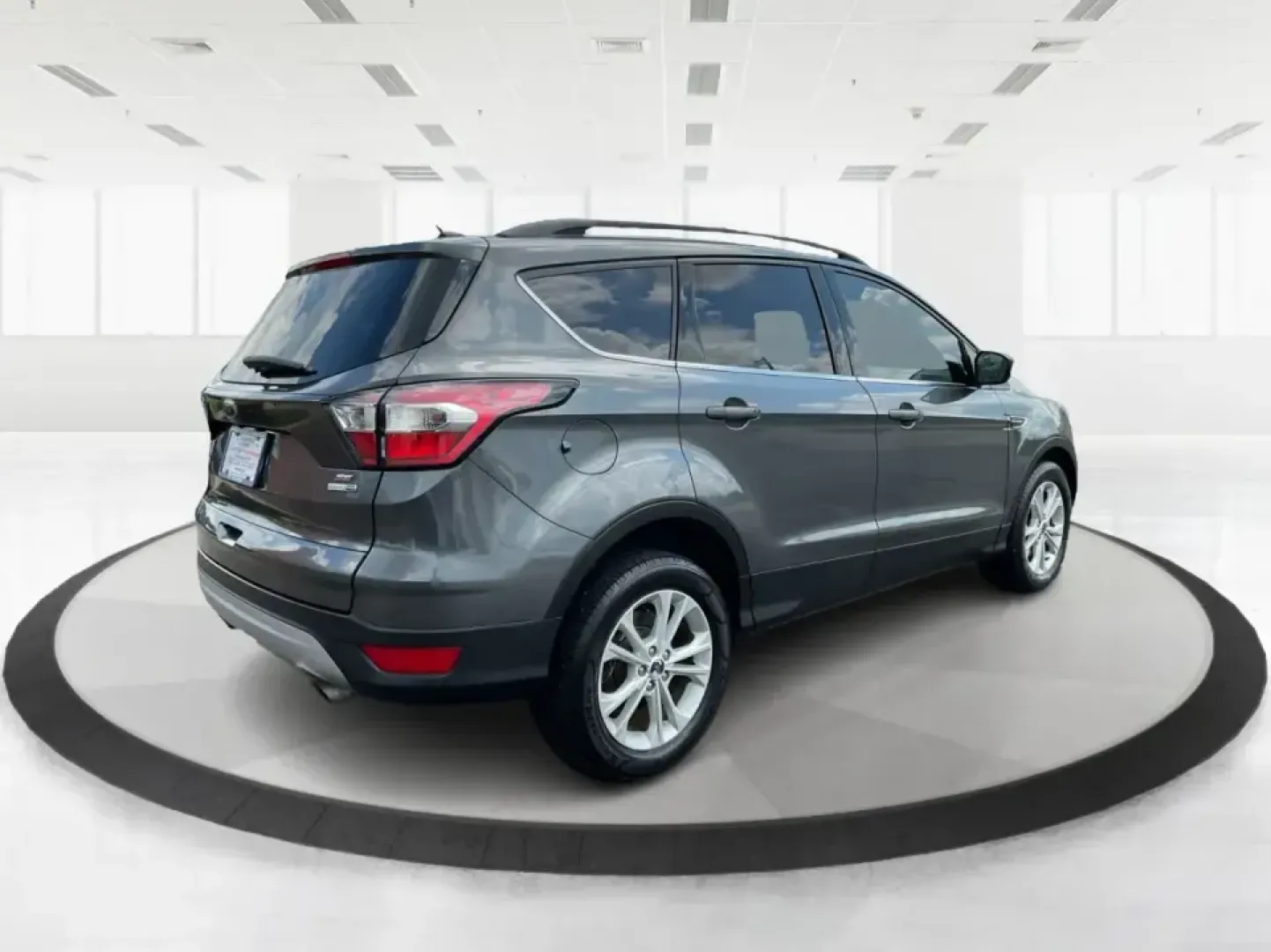 2017 Ford Escape SE (1FMCU9GD7HU) with an 1.5L L4 DOHC 16V engine, 6A transmission, located at 8750 N County Rd 25A, Piqua, OH, 45356, (937) 908-9800, 40.164391, -84.232513 - **Adventure Awaits With This 2017 Ford Escape SE! Perfect for Your Next Journey!**<br /> <br /> Are you ready to elevate your weekend getaways or daily commutes? The 2017 Ford Escape SE is the ideal SUV for those who crave versatility without sacrificing style. With a spacious interior, advanced saf - Photo#2
