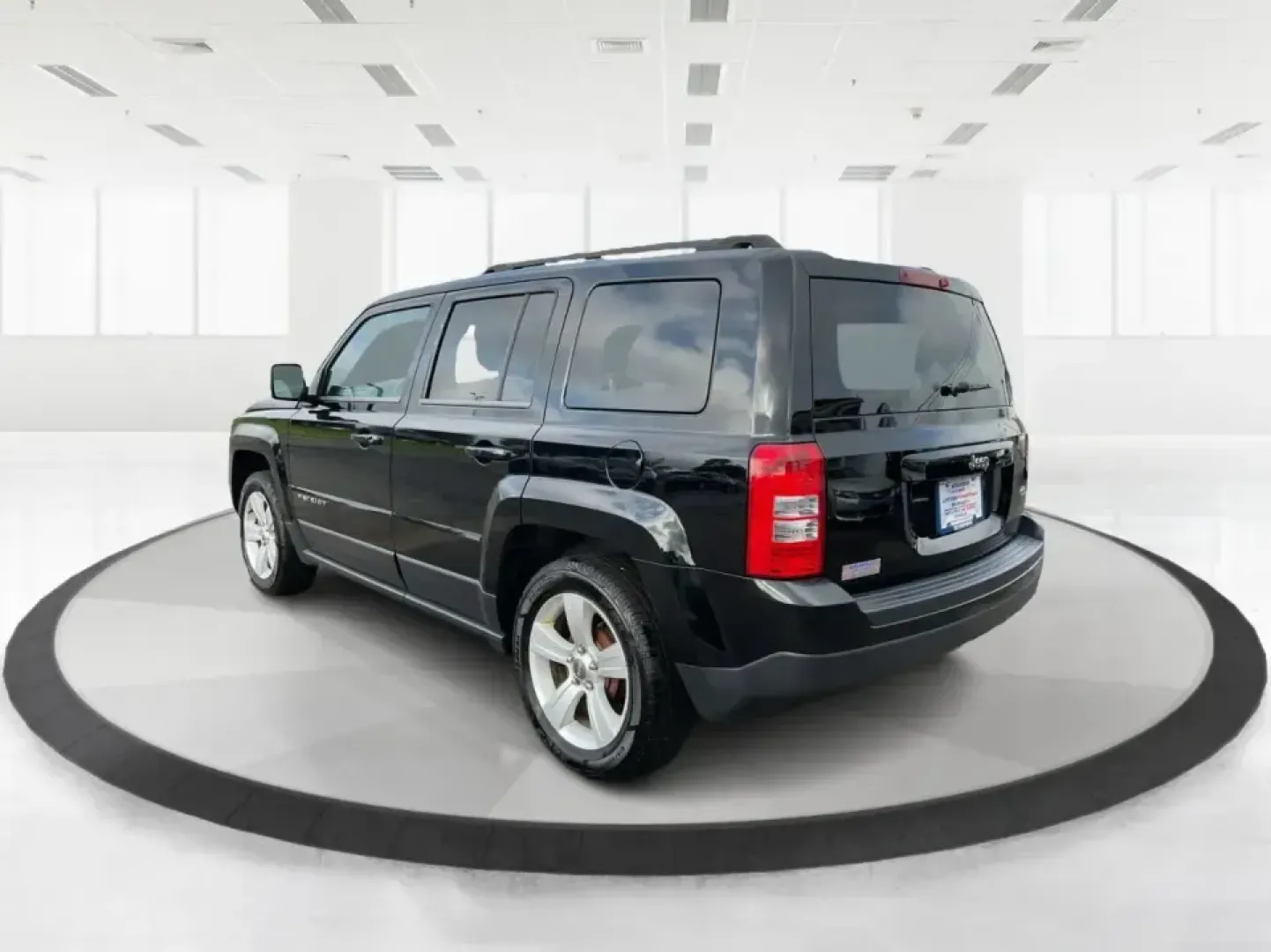 2014 Jeep Patriot Latitude (1C4NJPFA4ED) with an 2.0L L4 DOHC 16V engine, Automatic transmission, located at 880 E. National Road, Vandalia, OH, 45377, (937) 908-9800, 39.891918, -84.183594 - **Adventure Awaits with This 2014 Jeep Patriot Latitude at Advantage Car and Credit - Moraine!**<br /> <br /> Are you ready to embark on new adventures, whether it's a weekend getaway, a family road trip, or daily commutes? This 2014 Jeep Patriot Latitude is your perfect companion for all these scen - Photo#4
