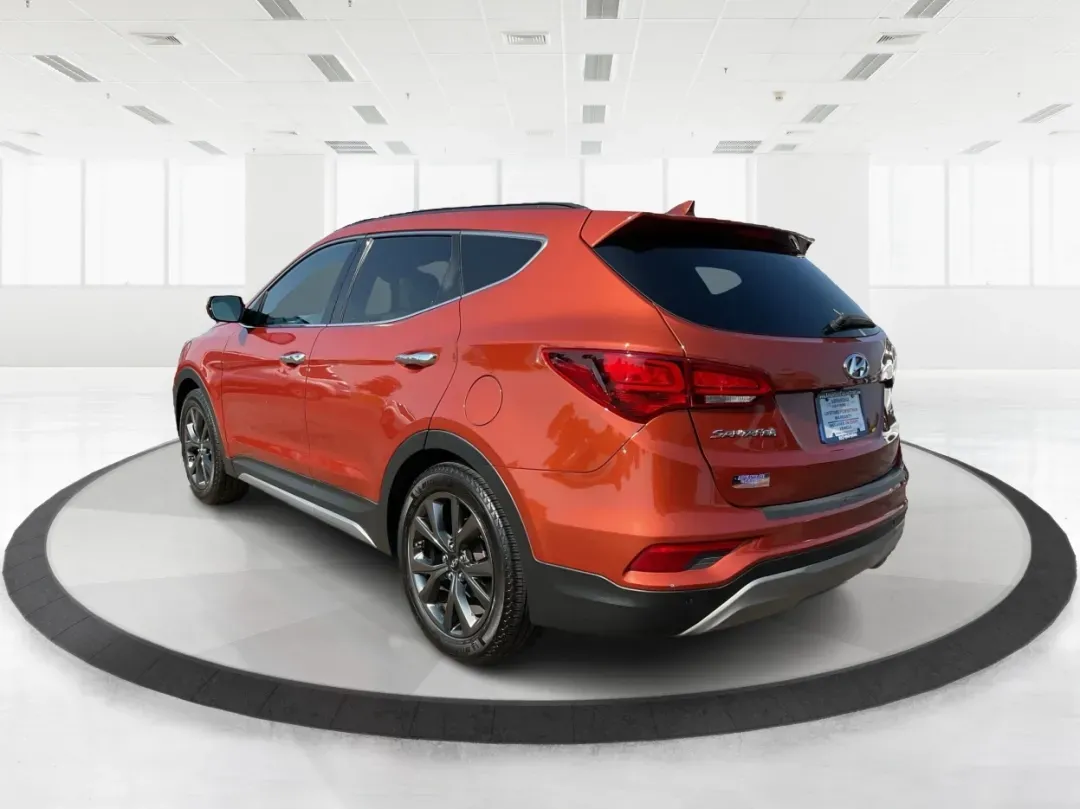 2017 Hyundai Santa Fe 2.0T Ultimate (5XYZW4LA5HG) with an Theta II 2L I-4 gasoline direct injection engine, located at 8750 N County Rd 25A, Piqua, OH, 45356, (937) 908-9800, 40.164391, -84.232513 - Are you ready to elevate your family adventures or commute comfortably while tackling any road with confidence? Look no further than this 2017 Hyundai Santa Fe 2.0T Ultimate, available now at Advantage Car and Credit in Fairborn, OH. This SUV is not just a vehicle; it's your ticket to creating unfor - Photo#4