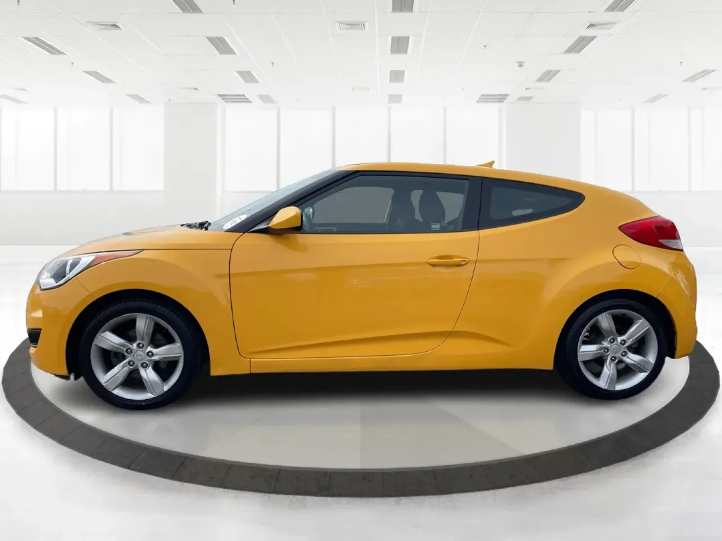 2015 Hyundai Veloster Base (KMHTC6AD3FU) with an Other engine, located at 1230 East Main St, Xenia, OH, 45385, (937) 908-9800, 39.688026, -83.910172 - **Unleash Your Adventurous Spirit with the 2015 Hyundai Veloster Perfect for Thrill-Seekers!**<br /> <br /> Are you ready to make every drive an adventure? The 2015 Hyundai Veloster is not just a car; it's a lifestyle upgrade! This sporty coupe, with its eye-catching yellow exterior, is designed fo - Photo#5