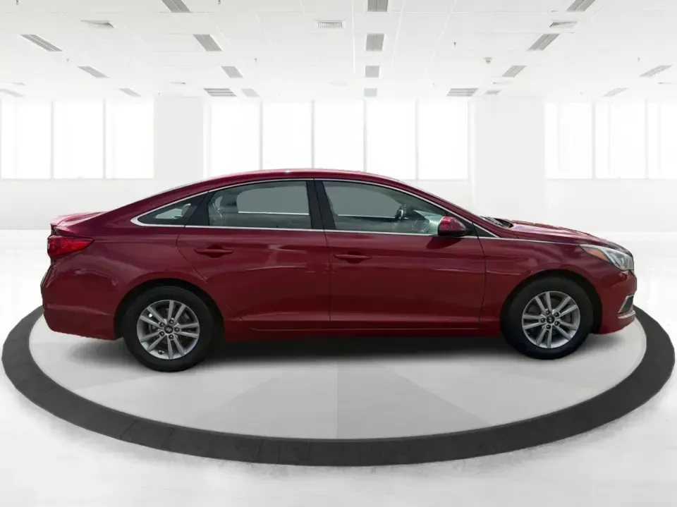 2017 Hyundai Sonata Base (5NPE24AF8HH) with an 2.4L L4 DOHC 16V engine, 7A transmission, located at 1099 N County Rd 25A, Troy, OH, 45373, (937) 908-9800, 40.057079, -84.212883 - Need a reliable, comfortable sedan for the daily drive from Troy to Dayton, school drop-offs, or quick weekend getaways to Charleston Falls Preserve? This red 2017 Hyundai Sonata Base is built for real life-easy to park downtown near the Miami County Courthouse, smooth on I75, and efficient enough f - Photo#1