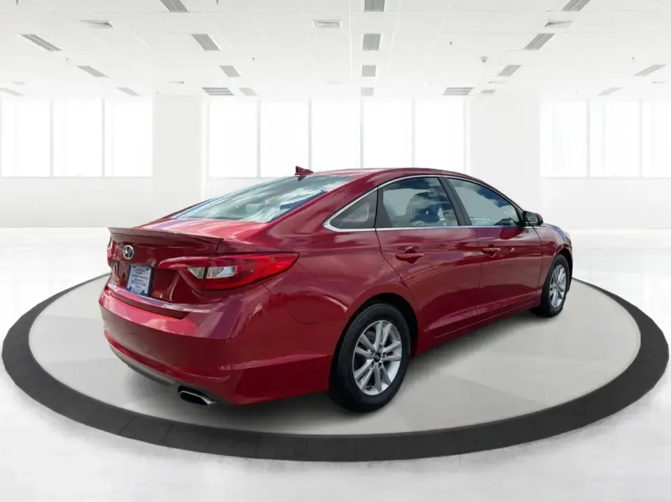 2017 Hyundai Sonata Base (5NPE24AF8HH) with an 2.4L L4 DOHC 16V engine, 7A transmission, located at 1099 N County Rd 25A, Troy, OH, 45373, (937) 908-9800, 40.057079, -84.212883 - Need a reliable, comfortable sedan for the daily drive from Troy to Dayton, school drop-offs, or quick weekend getaways to Charleston Falls Preserve? This red 2017 Hyundai Sonata Base is built for real life-easy to park downtown near the Miami County Courthouse, smooth on I75, and efficient enough f - Photo#2