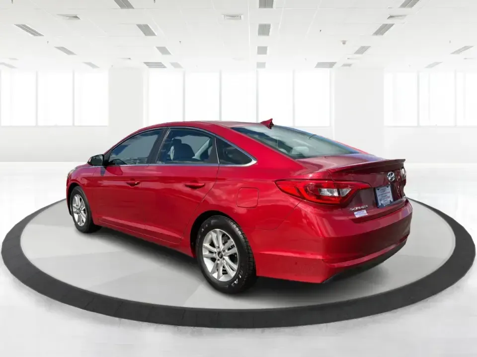 2017 Hyundai Sonata Base (5NPE24AF8HH) with an 2.4L L4 DOHC 16V engine, 7A transmission, located at 1099 N County Rd 25A, Troy, OH, 45373, (937) 908-9800, 40.057079, -84.212883 - Need a reliable, comfortable sedan for the daily drive from Troy to Dayton, school drop-offs, or quick weekend getaways to Charleston Falls Preserve? This red 2017 Hyundai Sonata Base is built for real life-easy to park downtown near the Miami County Courthouse, smooth on I75, and efficient enough f - Photo#4