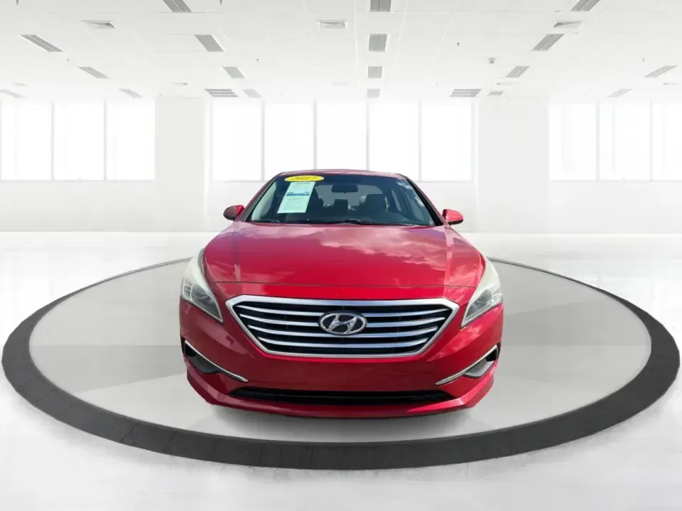 2017 Hyundai Sonata Base (5NPE24AF8HH) with an 2.4L L4 DOHC 16V engine, 7A transmission, located at 1099 N County Rd 25A, Troy, OH, 45373, (937) 908-9800, 40.057079, -84.212883 - Need a reliable, comfortable sedan for the daily drive from Troy to Dayton, school drop-offs, or quick weekend getaways to Charleston Falls Preserve? This red 2017 Hyundai Sonata Base is built for real life-easy to park downtown near the Miami County Courthouse, smooth on I75, and efficient enough f - Photo#7