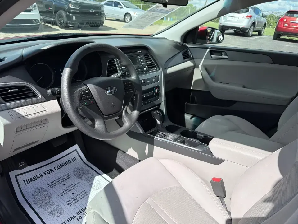 2017 Hyundai Sonata Base (5NPE24AF8HH) with an 2.4L L4 DOHC 16V engine, 7A transmission, located at 1099 N County Rd 25A, Troy, OH, 45373, (937) 908-9800, 40.057079, -84.212883 - Need a reliable, comfortable sedan for the daily drive from Troy to Dayton, school drop-offs, or quick weekend getaways to Charleston Falls Preserve? This red 2017 Hyundai Sonata Base is built for real life-easy to park downtown near the Miami County Courthouse, smooth on I75, and efficient enough f - Photo#9