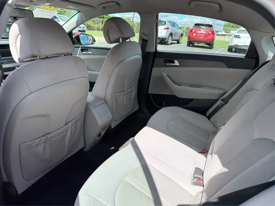 2017 Hyundai Sonata Base (5NPE24AF8HH) with an 2.4L L4 DOHC 16V engine, 7A transmission, located at 1099 N County Rd 25A, Troy, OH, 45373, (937) 908-9800, 40.057079, -84.212883 - Need a reliable, comfortable sedan for the daily drive from Troy to Dayton, school drop-offs, or quick weekend getaways to Charleston Falls Preserve? This red 2017 Hyundai Sonata Base is built for real life-easy to park downtown near the Miami County Courthouse, smooth on I75, and efficient enough f - Photo#10
