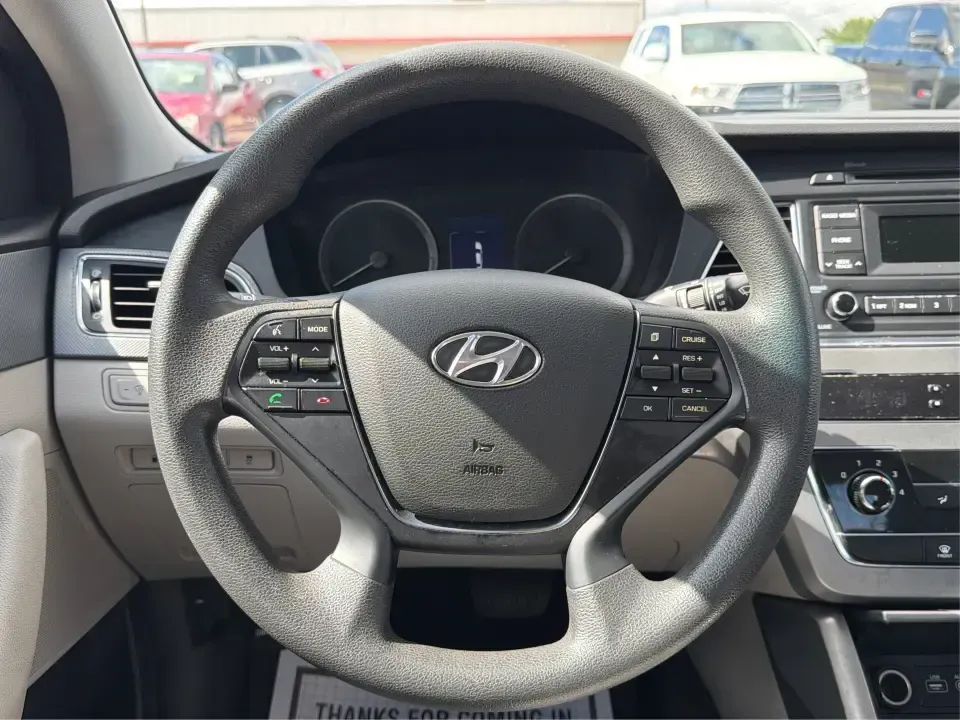 2017 Hyundai Sonata Base (5NPE24AF8HH) with an 2.4L L4 DOHC 16V engine, 7A transmission, located at 1099 N County Rd 25A, Troy, OH, 45373, (937) 908-9800, 40.057079, -84.212883 - Need a reliable, comfortable sedan for the daily drive from Troy to Dayton, school drop-offs, or quick weekend getaways to Charleston Falls Preserve? This red 2017 Hyundai Sonata Base is built for real life-easy to park downtown near the Miami County Courthouse, smooth on I75, and efficient enough f - Photo#16