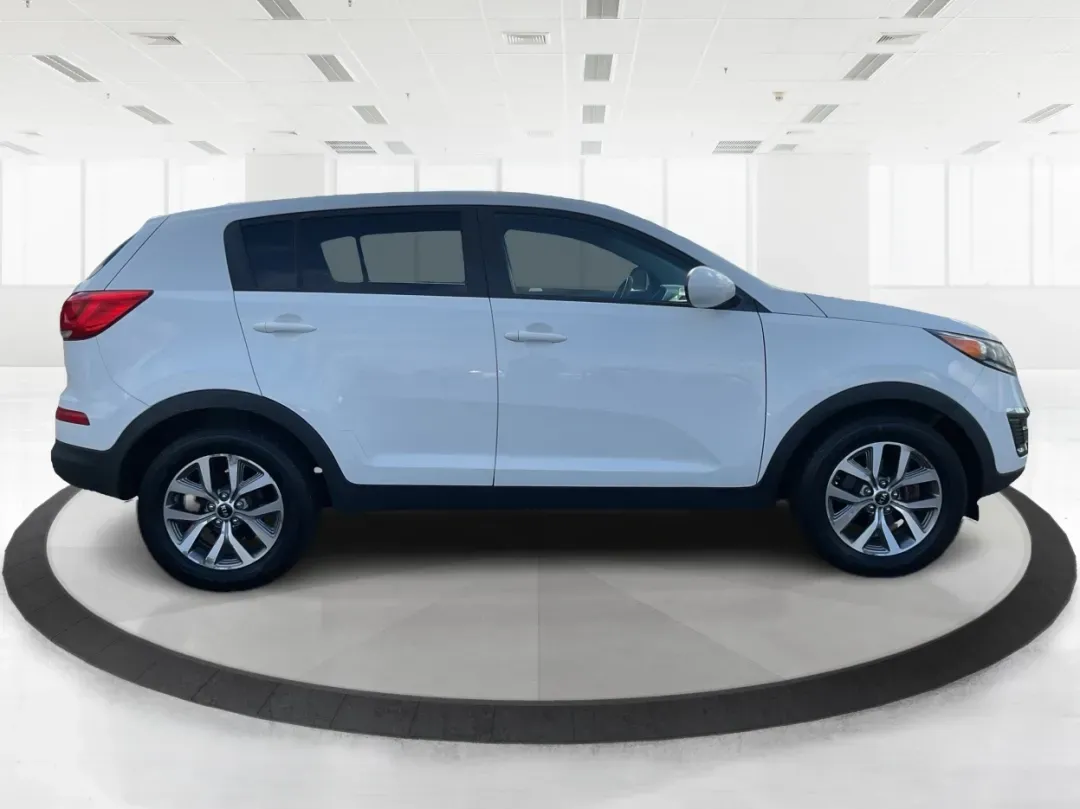 2015 Kia Sportage LX (KNDPB3AC1F7) with an Other engine, located at 4508 South Dixie Dr, Moraine, OH, 45439, (937) 908-9800, 39.689976, -84.218452 - Are you looking for a versatile vehicle that can handle your family's daily adventures while also being budget-friendly? Look no further than this 2015 Kia Sportage LX, now available at Advantage Car and Credit in Fairborn, OH. This stylish crossover SUV is perfect for growing families, weekend geta - Photo#1