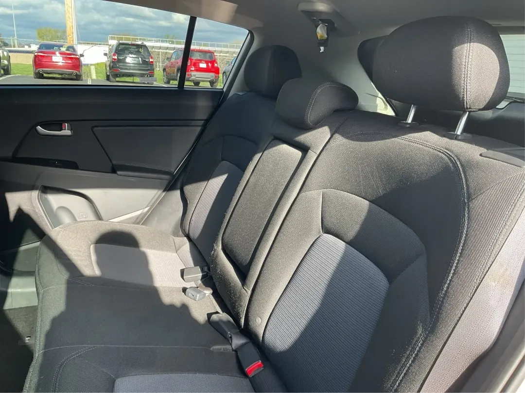 2015 Kia Sportage LX (KNDPB3AC1F7) with an Other engine, located at 4508 South Dixie Dr, Moraine, OH, 45439, (937) 908-9800, 39.689976, -84.218452 - Are you looking for a versatile vehicle that can handle your family's daily adventures while also being budget-friendly? Look no further than this 2015 Kia Sportage LX, now available at Advantage Car and Credit in Fairborn, OH. This stylish crossover SUV is perfect for growing families, weekend geta - Photo#9