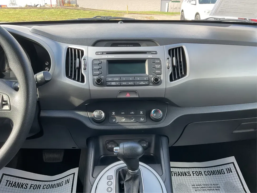 2015 Kia Sportage LX (KNDPB3AC1F7) with an Other engine, located at 4508 South Dixie Dr, Moraine, OH, 45439, (937) 908-9800, 39.689976, -84.218452 - Are you looking for a versatile vehicle that can handle your family's daily adventures while also being budget-friendly? Look no further than this 2015 Kia Sportage LX, now available at Advantage Car and Credit in Fairborn, OH. This stylish crossover SUV is perfect for growing families, weekend geta - Photo#12