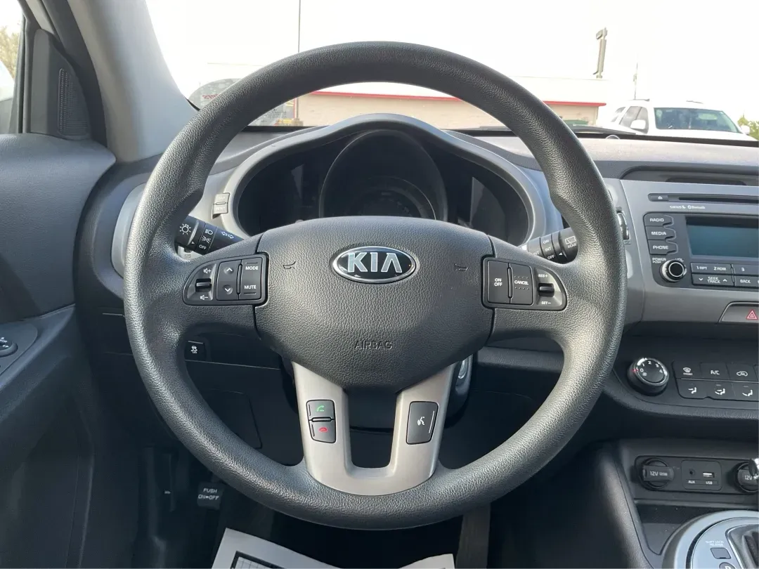 2015 Kia Sportage LX (KNDPB3AC1F7) with an Other engine, located at 4508 South Dixie Dr, Moraine, OH, 45439, (937) 908-9800, 39.689976, -84.218452 - Are you looking for a versatile vehicle that can handle your family's daily adventures while also being budget-friendly? Look no further than this 2015 Kia Sportage LX, now available at Advantage Car and Credit in Fairborn, OH. This stylish crossover SUV is perfect for growing families, weekend geta - Photo#15
