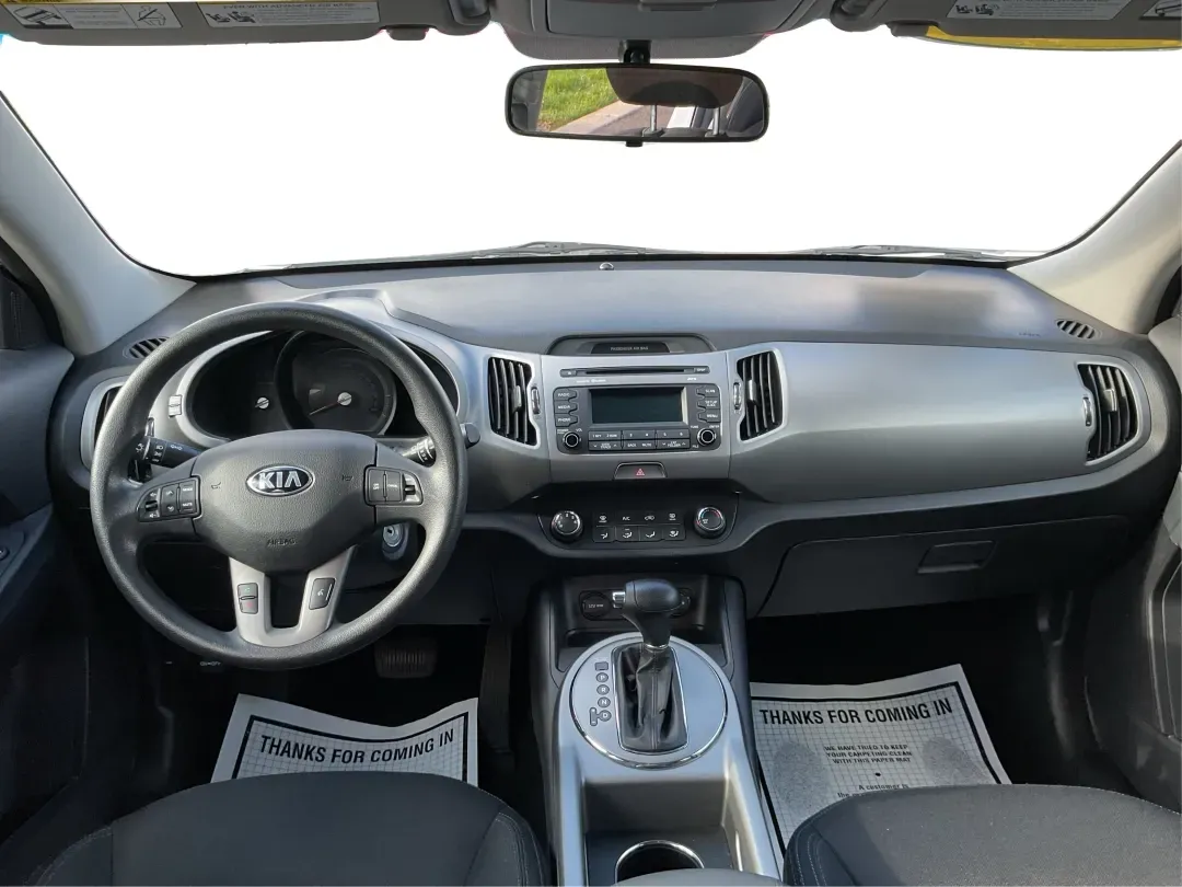 2015 Kia Sportage LX (KNDPB3AC1F7) with an Other engine, located at 4508 South Dixie Dr, Moraine, OH, 45439, (937) 908-9800, 39.689976, -84.218452 - Are you looking for a versatile vehicle that can handle your family's daily adventures while also being budget-friendly? Look no further than this 2015 Kia Sportage LX, now available at Advantage Car and Credit in Fairborn, OH. This stylish crossover SUV is perfect for growing families, weekend geta - Photo#18