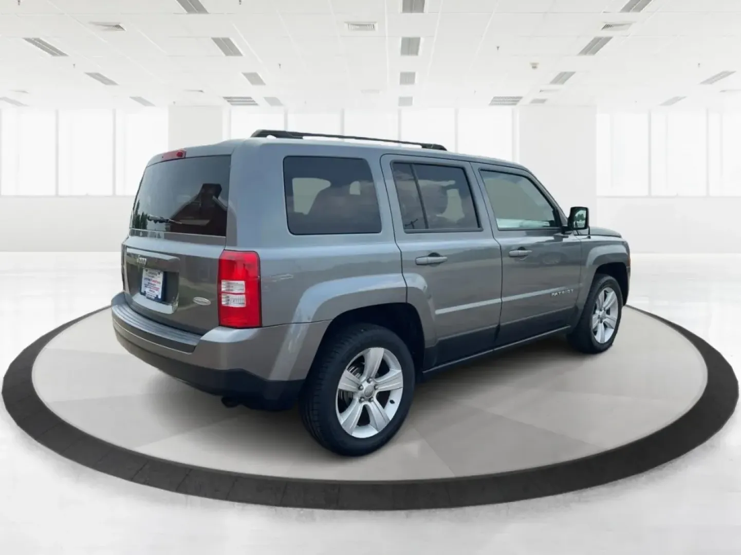2013 Jeep Patriot Latitude (1C4NJPFA8DD) with an Other engine, located at 1951 S Dayton Lakeview Rd., New Carlisle, OH, 45344, (937) 908-9800, 39.890999, -84.050255 - Ready to elevate your adventures? Meet the 2013 Jeep Patriot Latitude, a versatile SUV that perfectly balances rugged capability with everyday comfort. Whether you're navigating the bustling streets of Fairborn, OH, or heading out for a weekend getaway to the scenic parks nearby, this vehicle is des - Photo#2