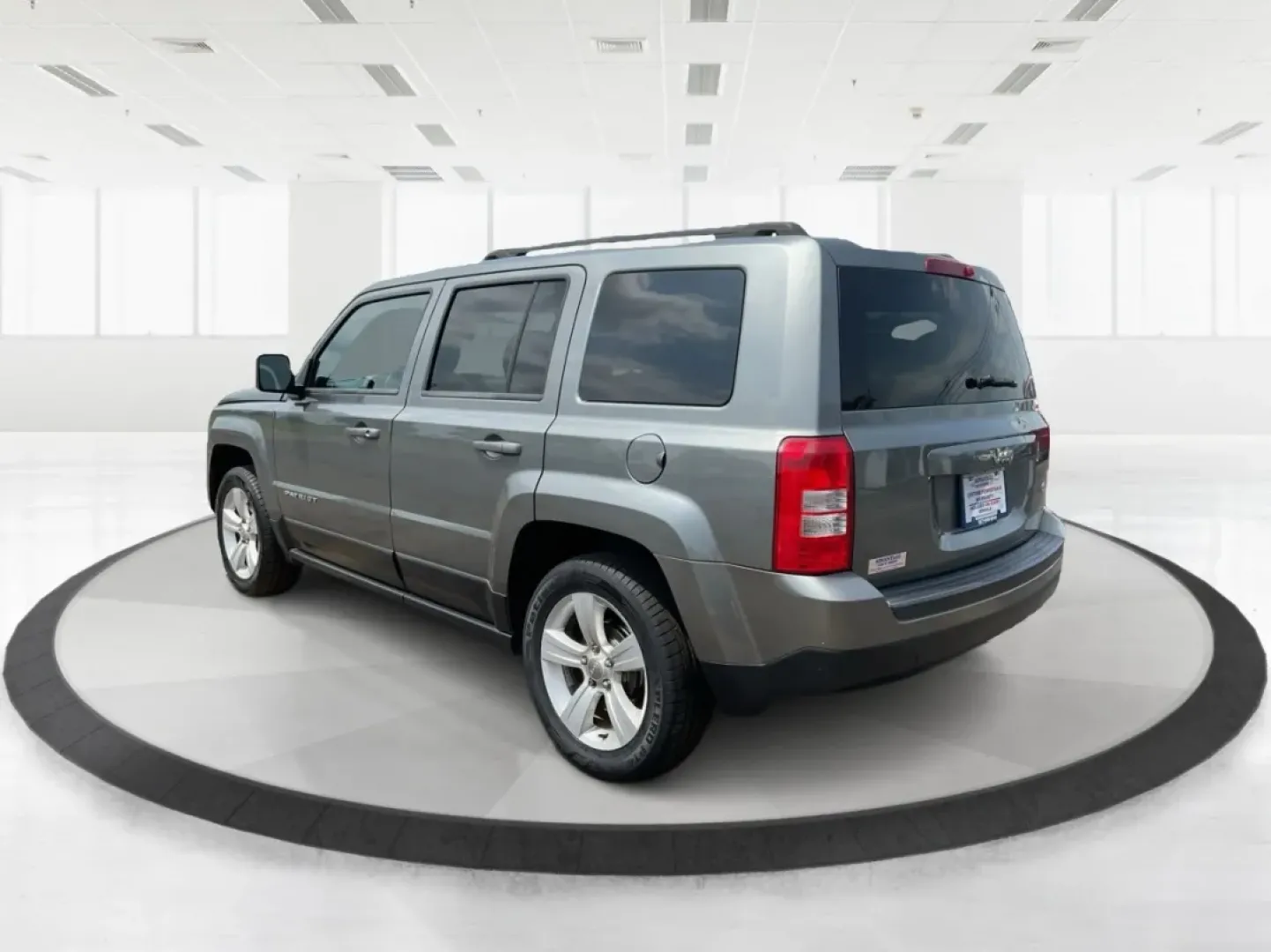 2013 Jeep Patriot Latitude (1C4NJPFA8DD) with an Other engine, located at 1951 S Dayton Lakeview Rd., New Carlisle, OH, 45344, (937) 908-9800, 39.890999, -84.050255 - Ready to elevate your adventures? Meet the 2013 Jeep Patriot Latitude, a versatile SUV that perfectly balances rugged capability with everyday comfort. Whether you're navigating the bustling streets of Fairborn, OH, or heading out for a weekend getaway to the scenic parks nearby, this vehicle is des - Photo#4