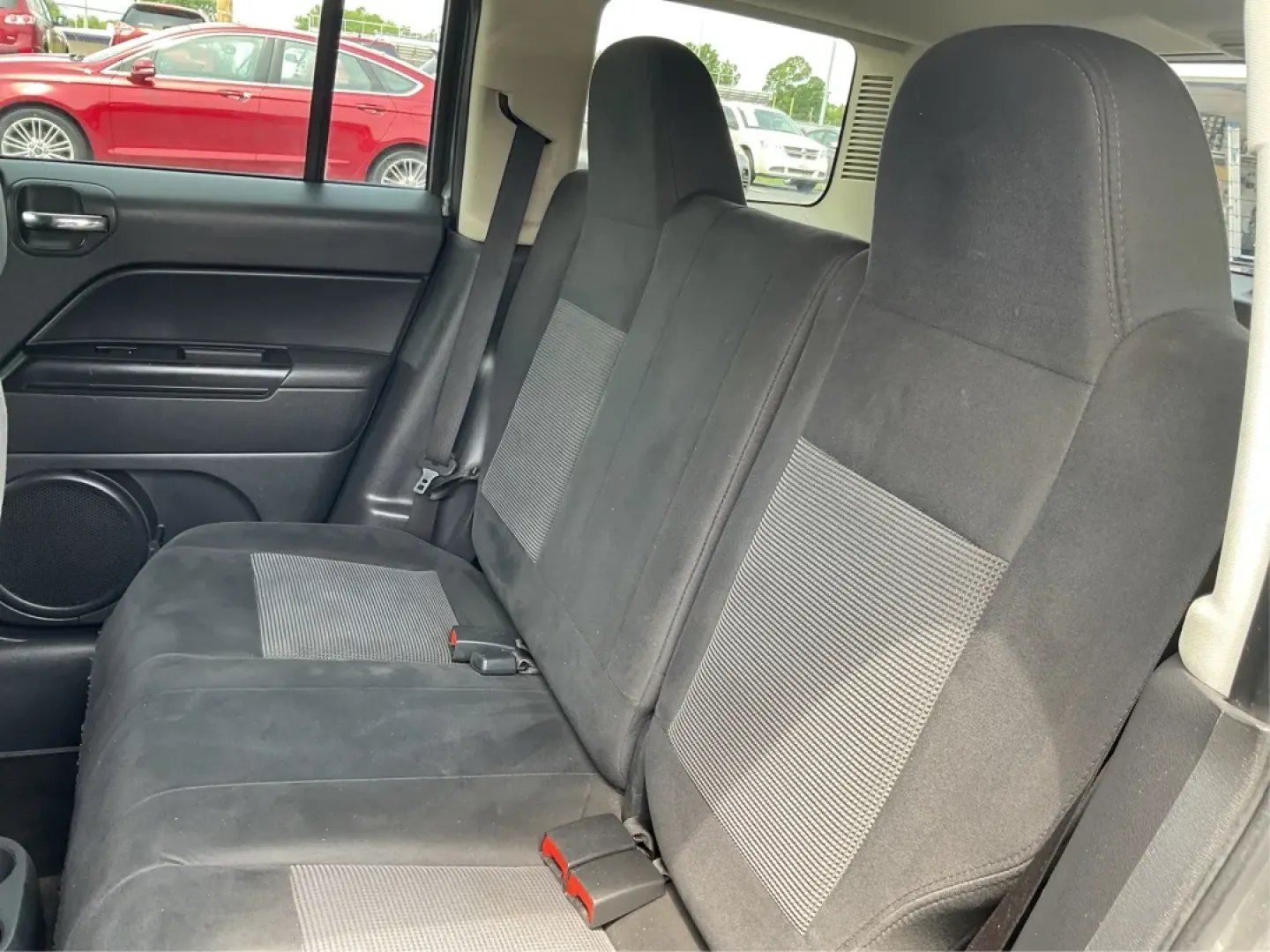 2013 Jeep Patriot Latitude (1C4NJPFA8DD) with an Other engine, located at 1951 S Dayton Lakeview Rd., New Carlisle, OH, 45344, (937) 908-9800, 39.890999, -84.050255 - Ready to elevate your adventures? Meet the 2013 Jeep Patriot Latitude, a versatile SUV that perfectly balances rugged capability with everyday comfort. Whether you're navigating the bustling streets of Fairborn, OH, or heading out for a weekend getaway to the scenic parks nearby, this vehicle is des - Photo#10