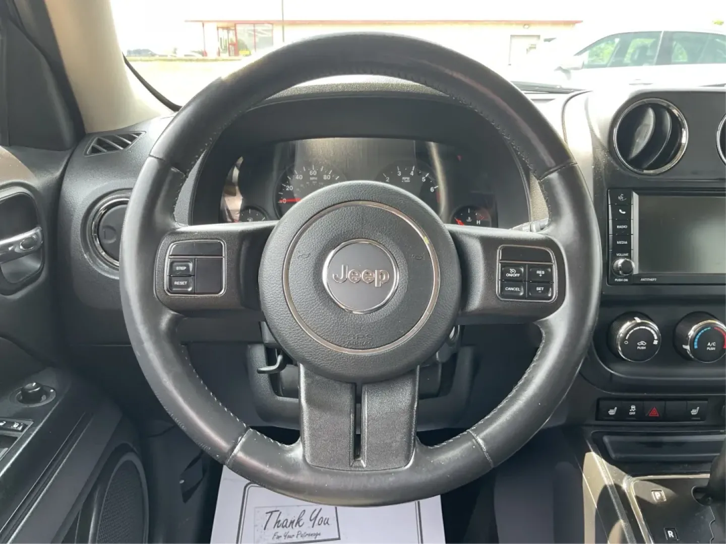 2013 Jeep Patriot Latitude (1C4NJPFA8DD) with an Other engine, located at 1951 S Dayton Lakeview Rd., New Carlisle, OH, 45344, (937) 908-9800, 39.890999, -84.050255 - Ready to elevate your adventures? Meet the 2013 Jeep Patriot Latitude, a versatile SUV that perfectly balances rugged capability with everyday comfort. Whether you're navigating the bustling streets of Fairborn, OH, or heading out for a weekend getaway to the scenic parks nearby, this vehicle is des - Photo#16