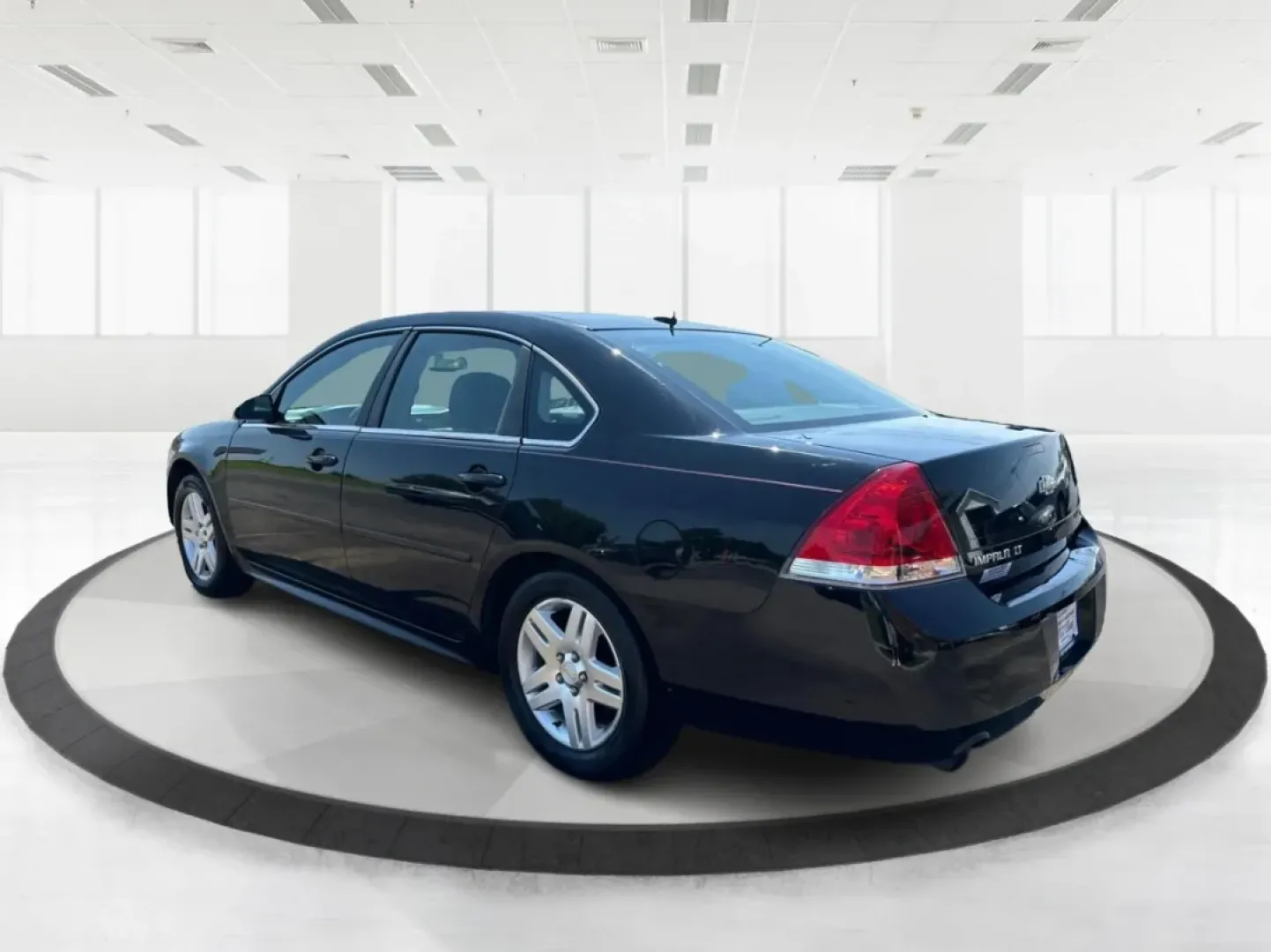 2014 Chevrolet Impala Limited LT (2G1WB5E3XE1) with an 3.6L V-6 gasoline direct injection engine, located at 8750 N County Rd 25A, Piqua, OH, 45356, (937) 908-9800, 40.164391, -84.232513 - Are you ready for your next adventure, whether it's a family road trip, a daily commute, or simply running errands around Fairborn? The 2014 Chevrolet Impala Limited LT is the perfect sedan to elevate your driving experience. With its stylish black exterior and reliable performance, this vehicle is - Photo#4