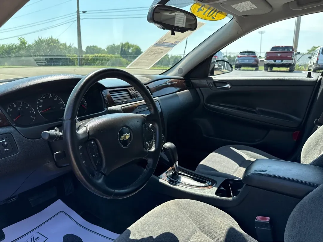 2014 Chevrolet Impala Limited LT (2G1WB5E3XE1) with an 3.6L V-6 gasoline direct injection engine, located at 1230 East Main St, Xenia, OH, 45385, (937) 908-9800, 39.688026, -83.910172 - Are you ready for your next adventure, whether it's a family road trip, a daily commute, or simply running errands around Fairborn? The 2014 Chevrolet Impala Limited LT is the perfect sedan to elevate your driving experience. With its stylish black exterior and reliable performance, this vehicle is - Photo#9