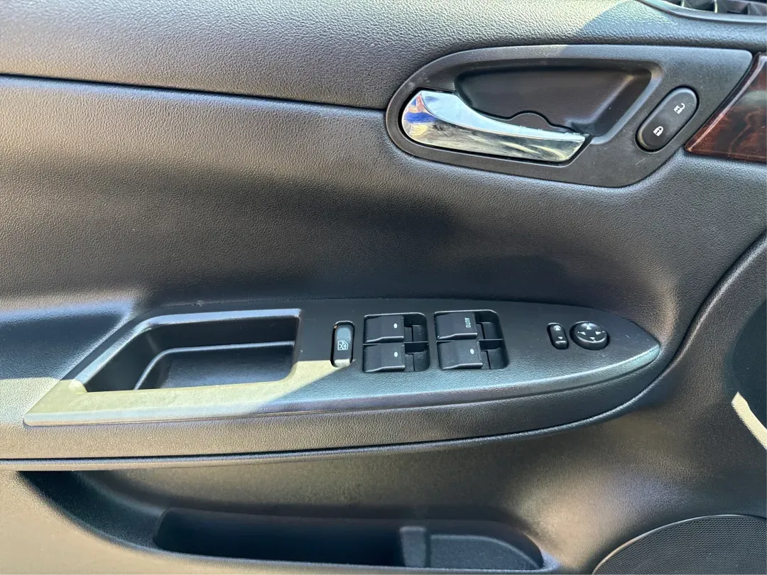 2014 Chevrolet Impala Limited LT (2G1WB5E3XE1) with an 3.6L V-6 gasoline direct injection engine, located at 1230 East Main St, Xenia, OH, 45385, (937) 908-9800, 39.688026, -83.910172 - Are you ready for your next adventure, whether it's a family road trip, a daily commute, or simply running errands around Fairborn? The 2014 Chevrolet Impala Limited LT is the perfect sedan to elevate your driving experience. With its stylish black exterior and reliable performance, this vehicle is - Photo#19