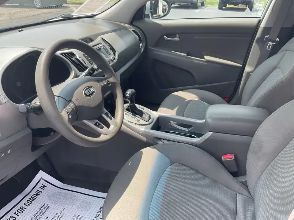 2016 Kia Sportage LX (KNDPBCACXG7) with an Theta II 2.4L I-4 gasoline direct injection engine, 6-Speed Automatic transmission, located at 1230 East Main St, Xenia, OH, 45385, (937) 908-9800, 39.688026, -83.910172 - Embrace the journey of life with the 2016 Kia Sportage LX, a vehicle designed for those who thrive on adventure and seek comfort in their daily commute. Whether you're navigating the bustling streets of Fairborn, OH, or embarking on a weekend family getaway, this versatile crossover is your perfect - Photo#9